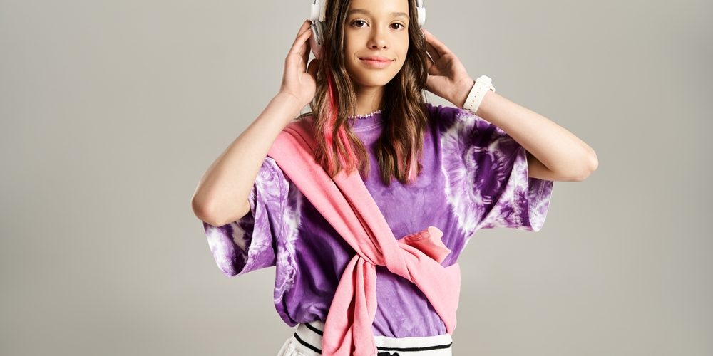 A,Stylish,Teenage,Girl,In,A,Vibrant,Purple,Shirt,Wearing